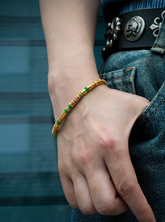 jadeite, gold, and diamond bracelet