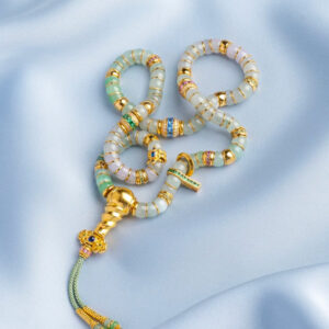 jadeite, gold, and diamond bracelet set